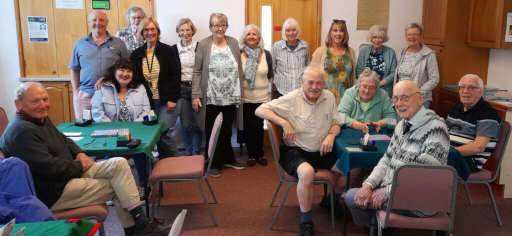 16 members of the Bridge Group gathered around the tables in the Dursley Methodist Church.